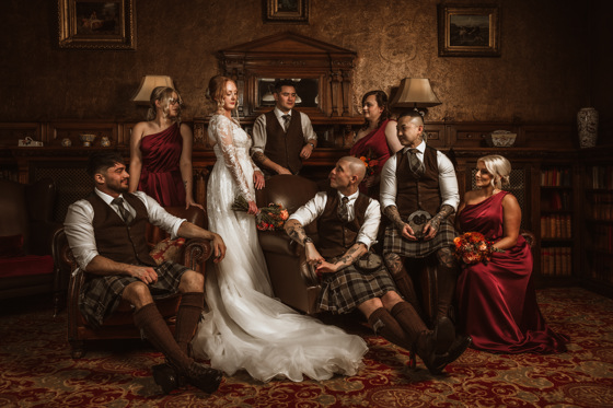 Regal-style image of bride, groom and their bridesmaids and groomsmen at Norwood Hall Hotel